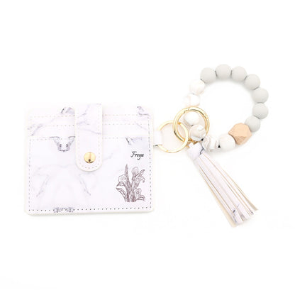Personalisierter floraler Kartenhalter mit Perlenarmband und Quaste