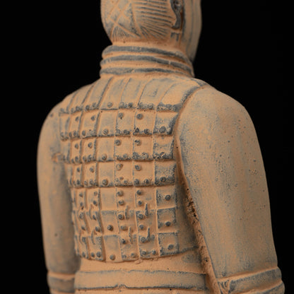15CM Cavalryman - CLAYARMY-Close-up of the 15CM Terracotta Army Cavalryman's face, revealing intricate armor details and a distinct flat bun hairstyle.