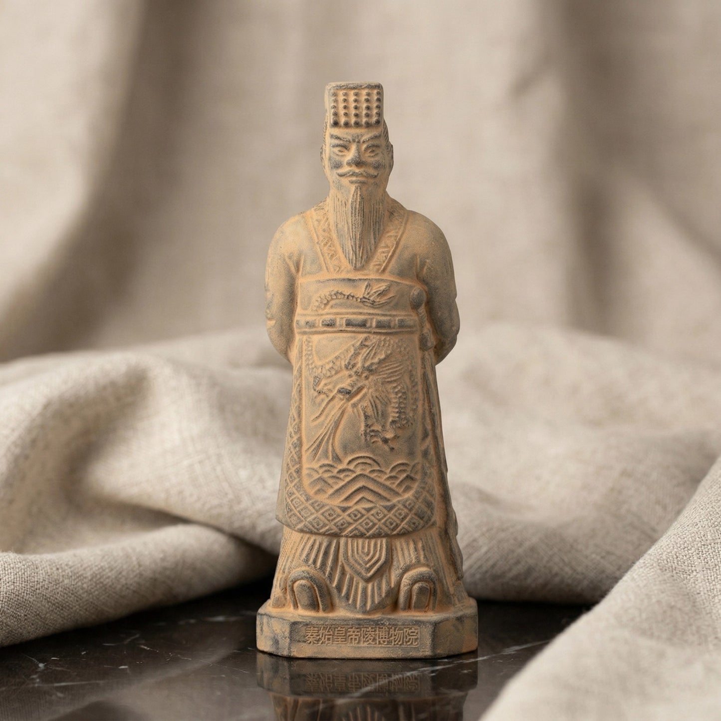 15CM Emperor - CLAYARMY -Close-up detail of Clayarmy's 15CM Emperor Qin Terracotta Warrior, showcasing exquisite craftsmanship in yellow-brown clay.