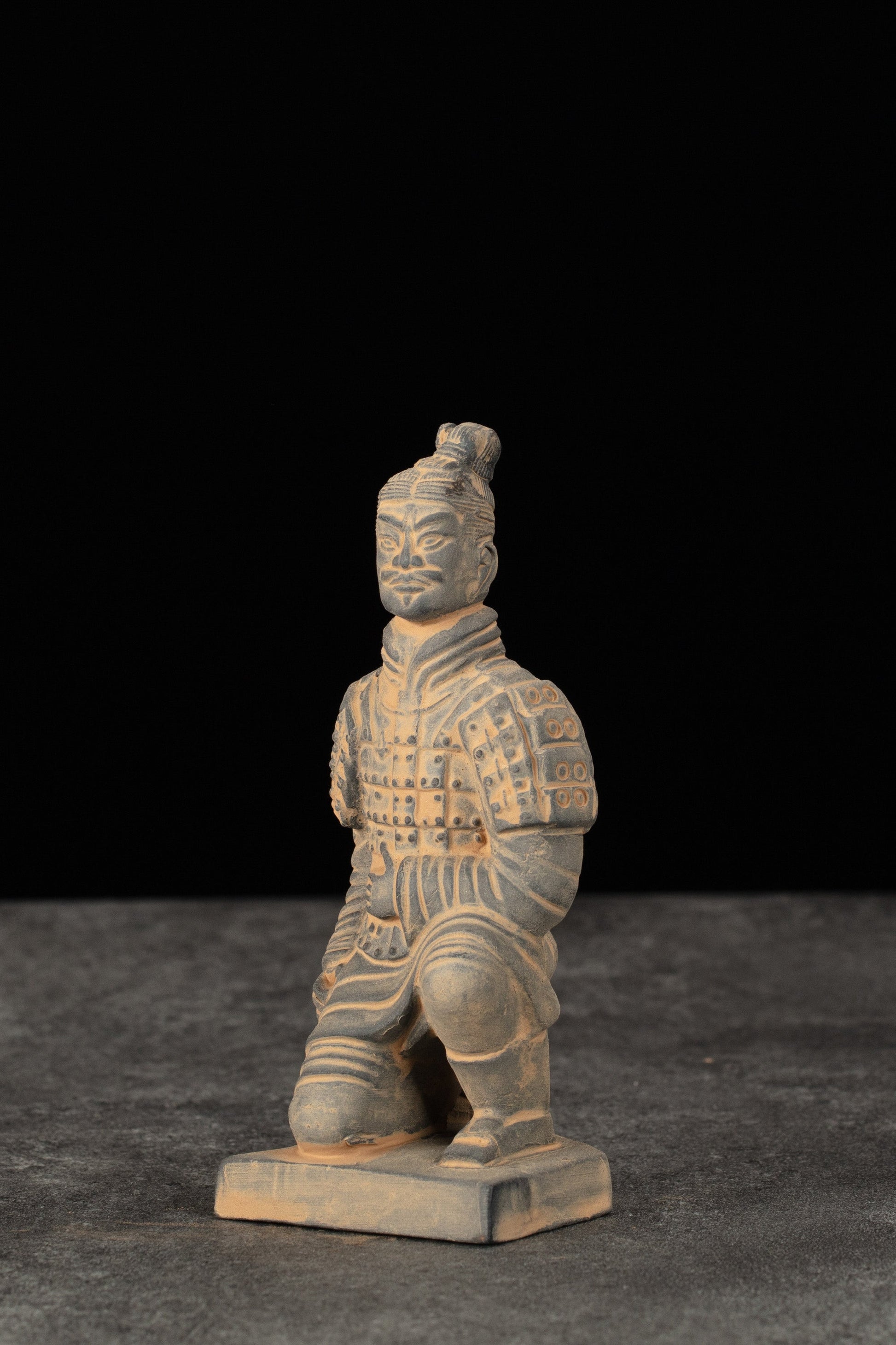 15CM Kneeling Archer - CLAYARMY-Side profile showcasing the dynamic pose and hand-painted features of the 15CM Kneeling Archer.