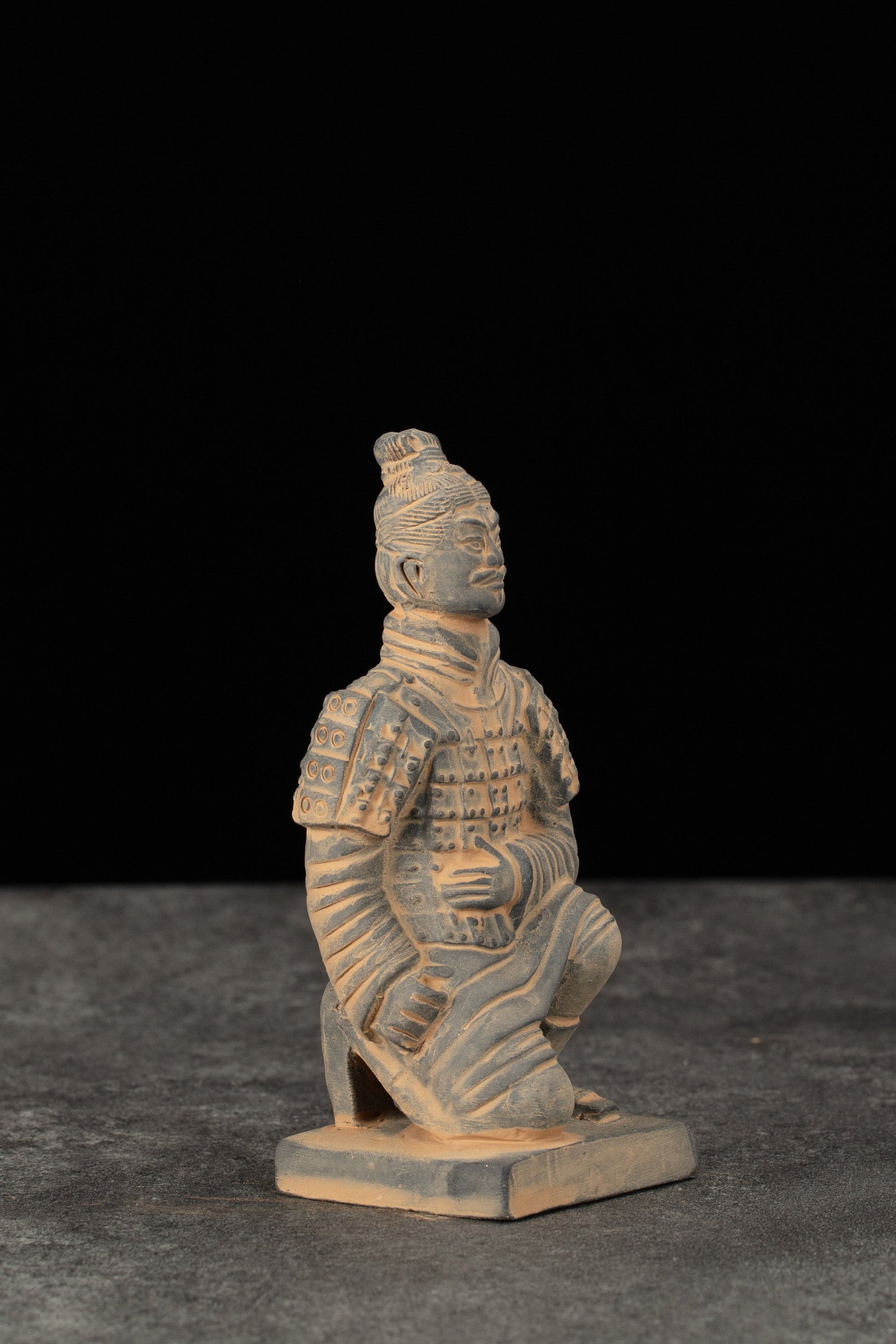 15CM Kneeling Archer - CLAYARMY-Unique angle capturing the hand-painted footwear and base details on the 15CM Kneeling Archer.