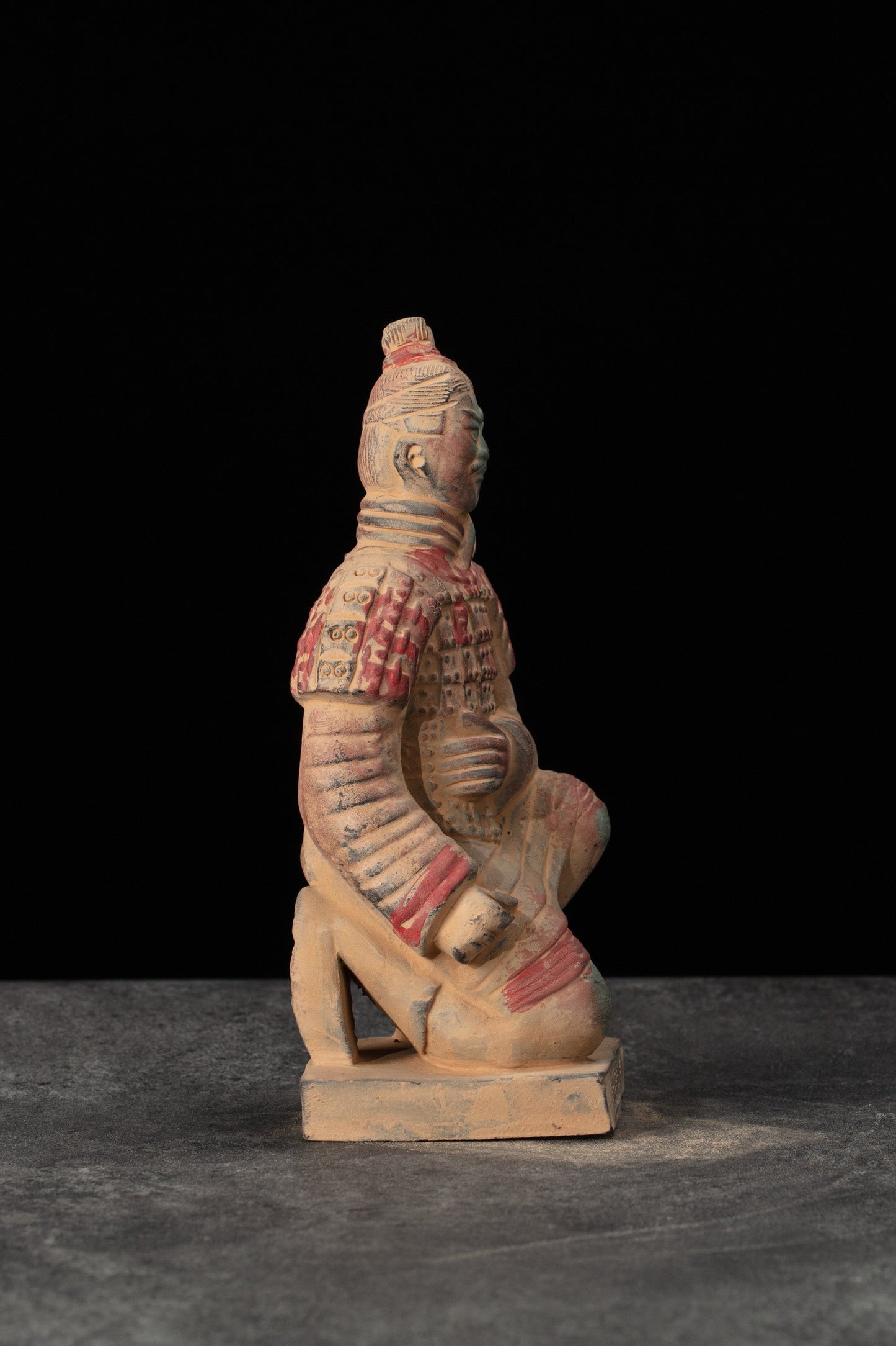 20CM Painted Kneeling Archer - CLAYARMY-Side profile of the 20CM Painted Soldier figurine showcasing intricate details in the painting.