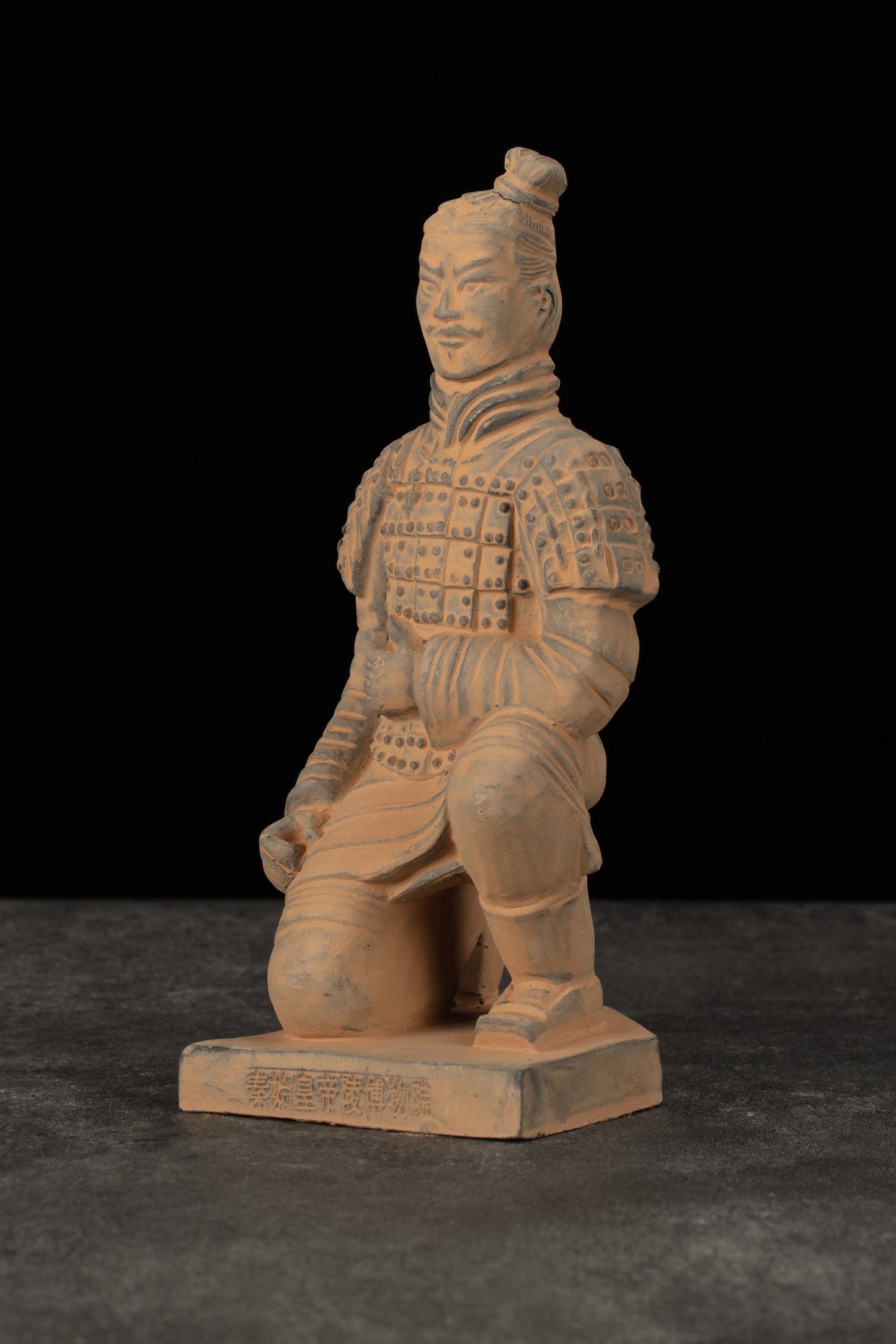 20CM Kneeling Archer - CLAYARMY-Side profile showcasing the dynamic pose and hand-painted features of the 20CM Kneeling Archer.