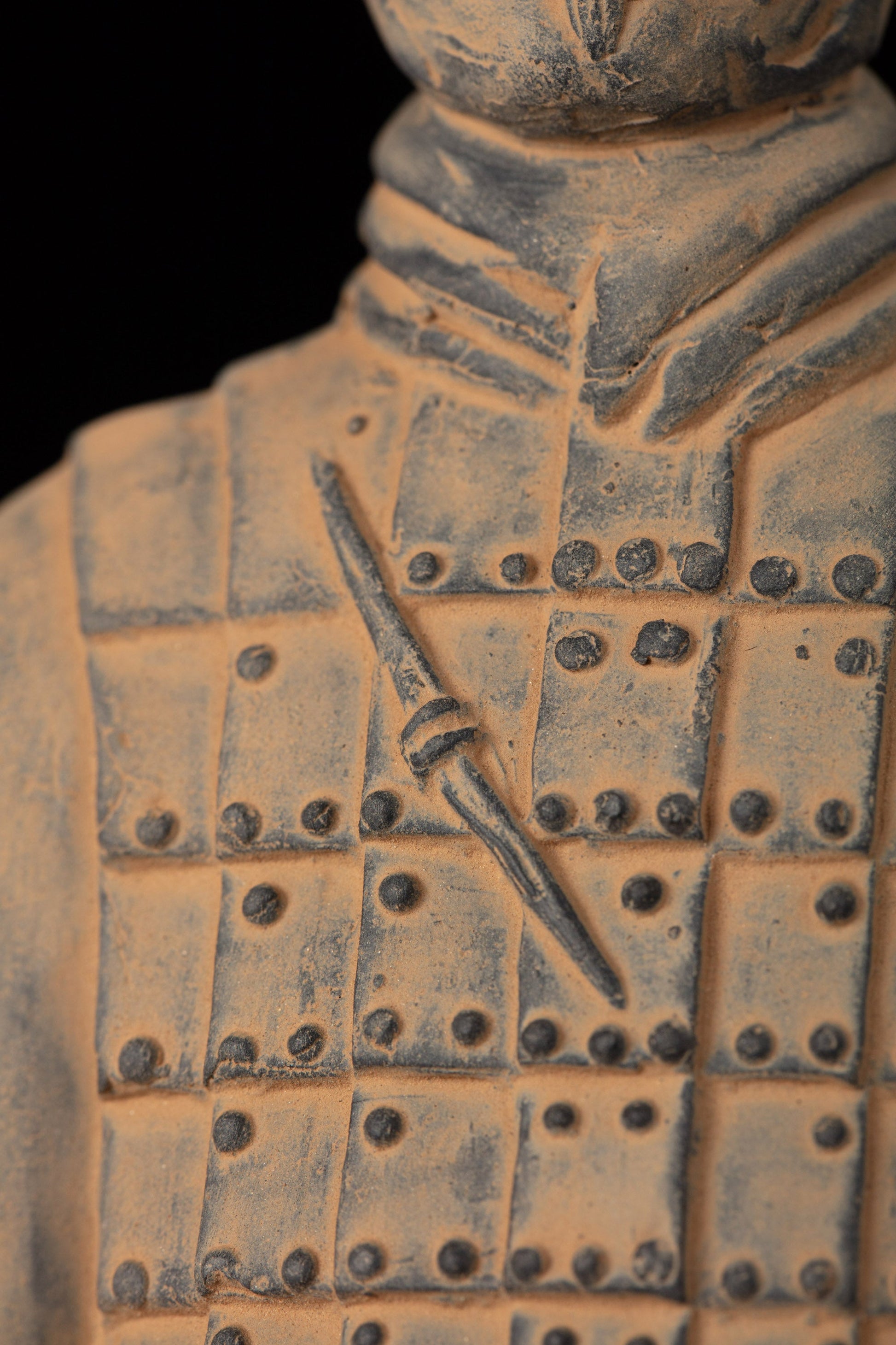 25CM Cavalryman - CLAYARMY-Aerial perspective showcasing the 25CM Cavalryman figurine, emphasizing the intricate craftsmanship of the flat bun and the distinctive red accents on the armor.