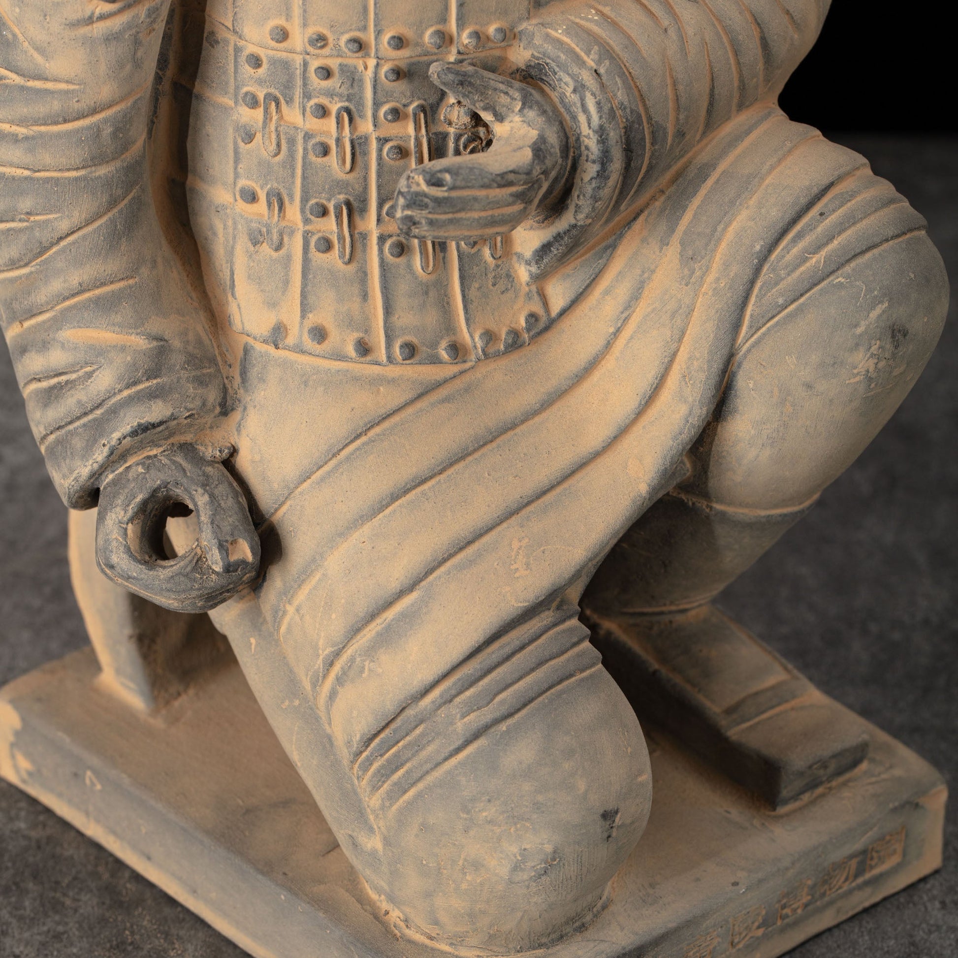 45CM Kneeling Archer - CLAYARMY-Overhead perspective capturing the isosceles triangle posture for stability on the 45CM Kneeling Archer.
