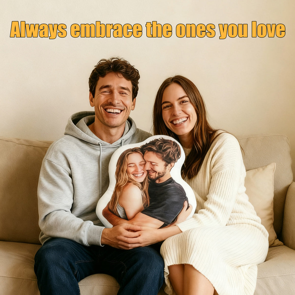 a couple hold their hugging-shaped pillow with big smile