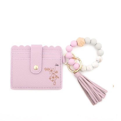 Personalisierter floraler Kartenhalter mit Perlenarmband und Quaste