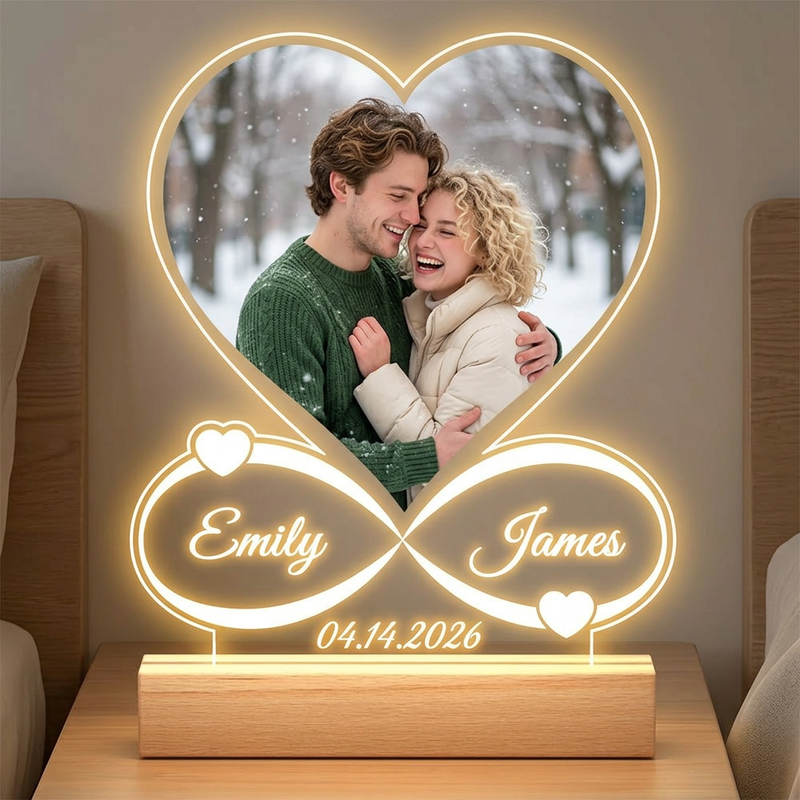 Heart-shaped personalized photo night light displaying a couple's photo and names Emily and James