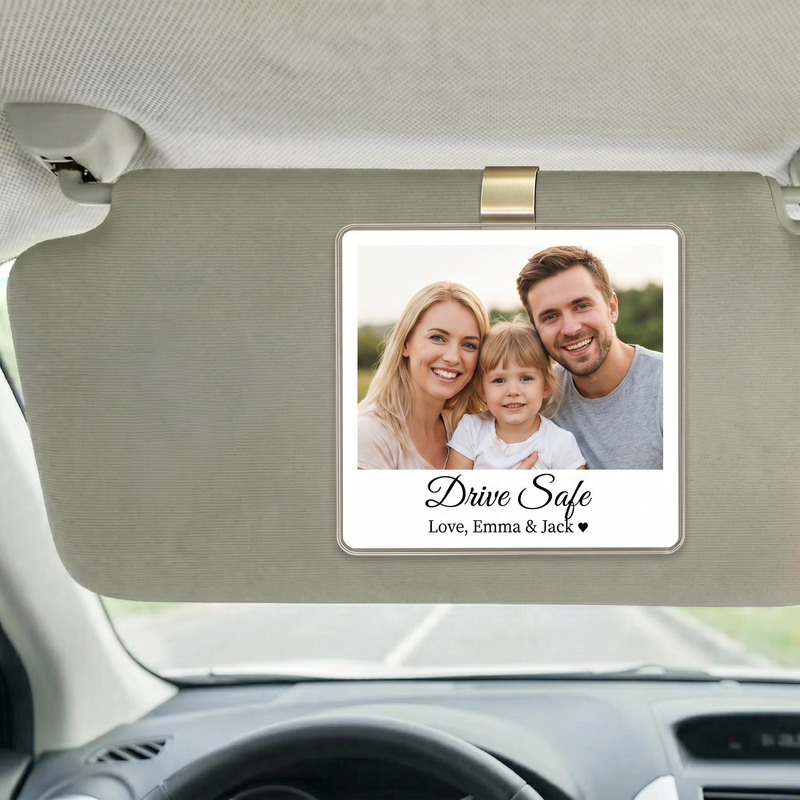 Personalized photo car magnet displaying a family picture on a vehicle dashboard