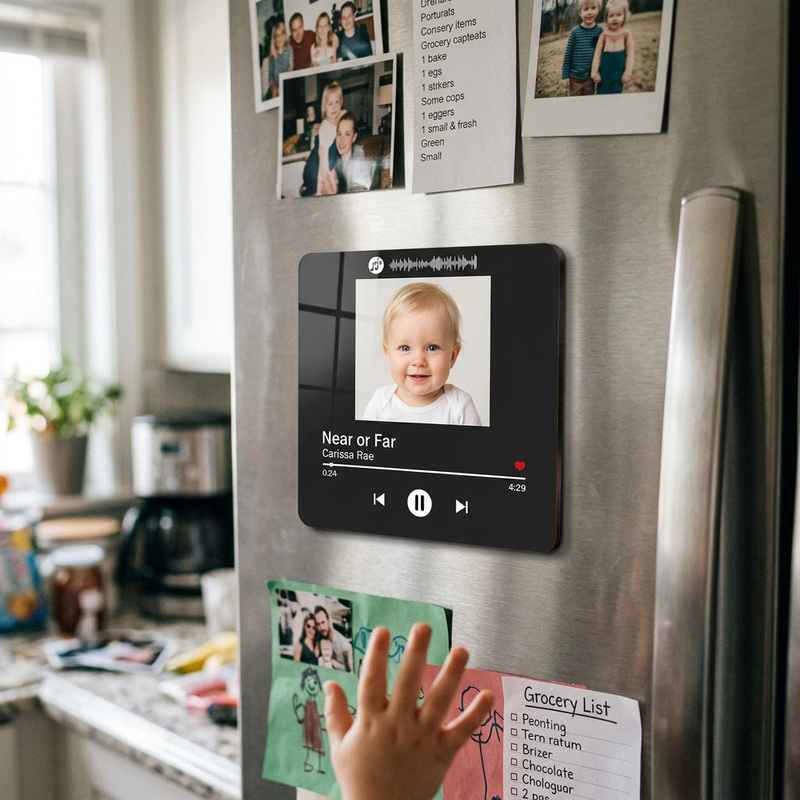 Personalized photo music fridge magnet featuring a baby photo mounted on a refrigerator