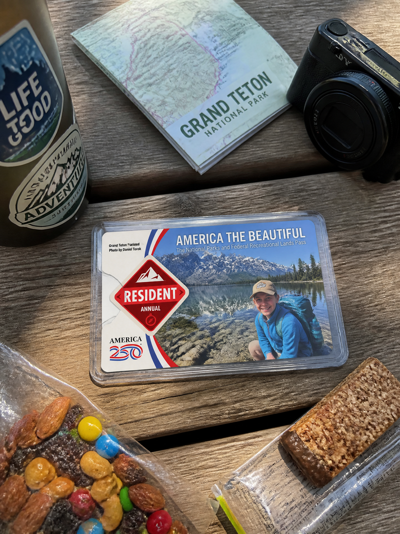 Personalized travel photo keepsake displayed with a camera and Grand Canyon souvenirs