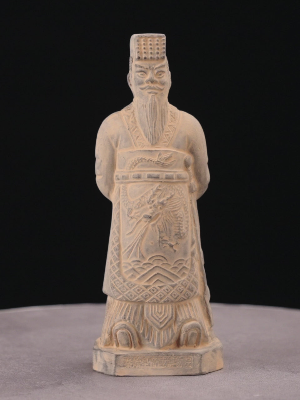 15CM Emperor - CLAYARMY -Close-up detail of Clayarmy's 15CM Emperor Qin Terracotta Warrior, showcasing exquisite craftsmanship in yellow-brown clay.